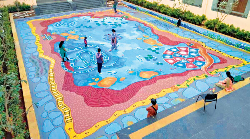 Artist Paints Pond on a School’s Floor