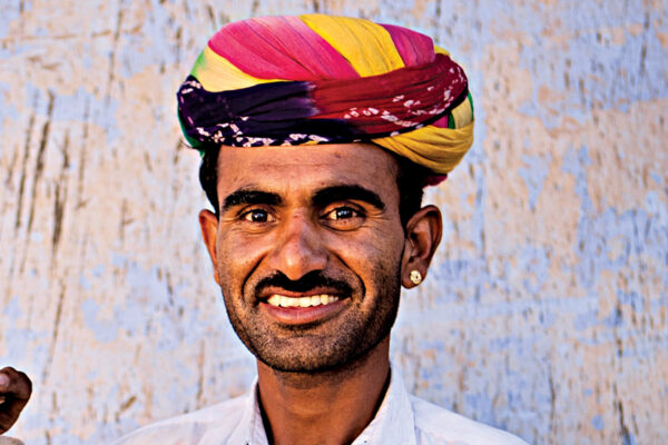 Why Do Men Wear Gemstone Earrings in Desert Regions?