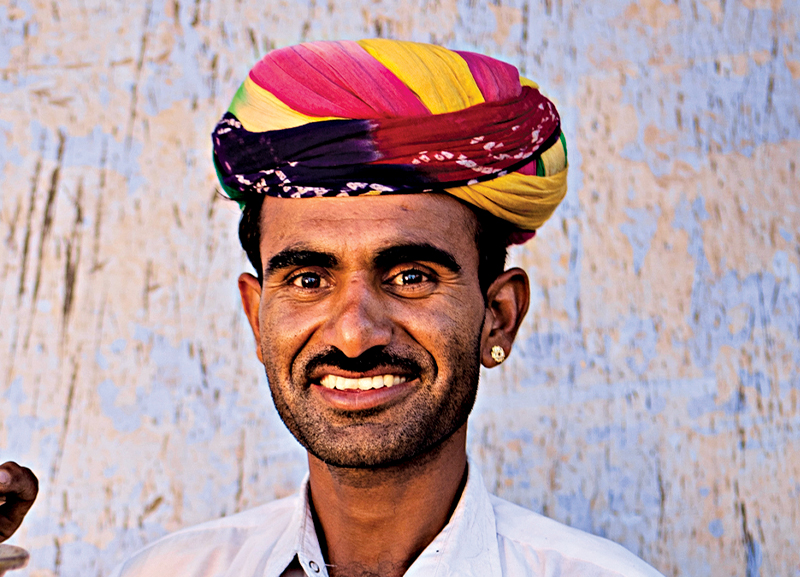 Why Do Men Wear Gemstone Earrings in Desert Regions?